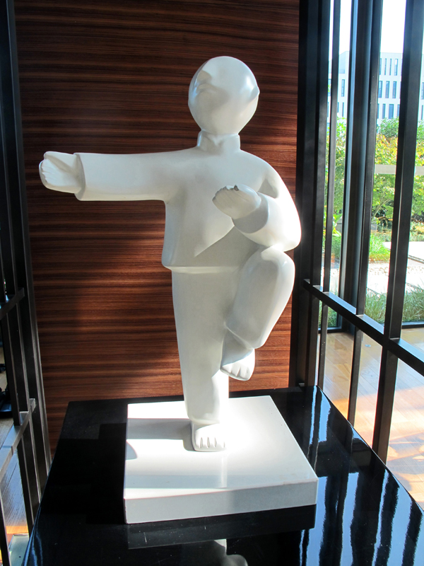 Langham Place hotel, with a statue in the reception hall