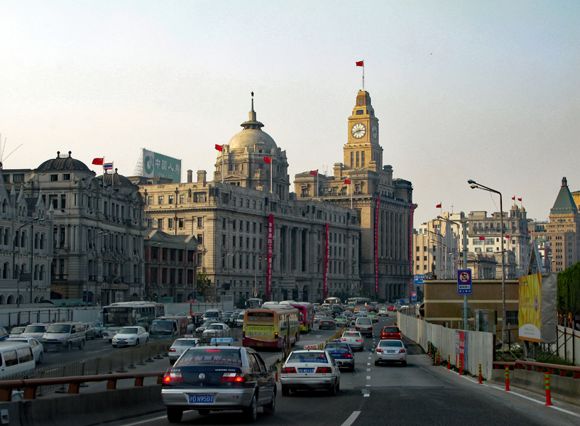 Arrival by the express way to the famous Bund Boulevard marked out by impressive buildings in European colonial style from the 1930s